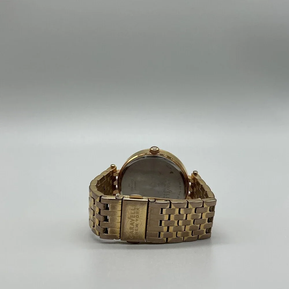 Caravelle New York Womens Watch 38mm MOP Gold Tone Day Date New Battery 5.75